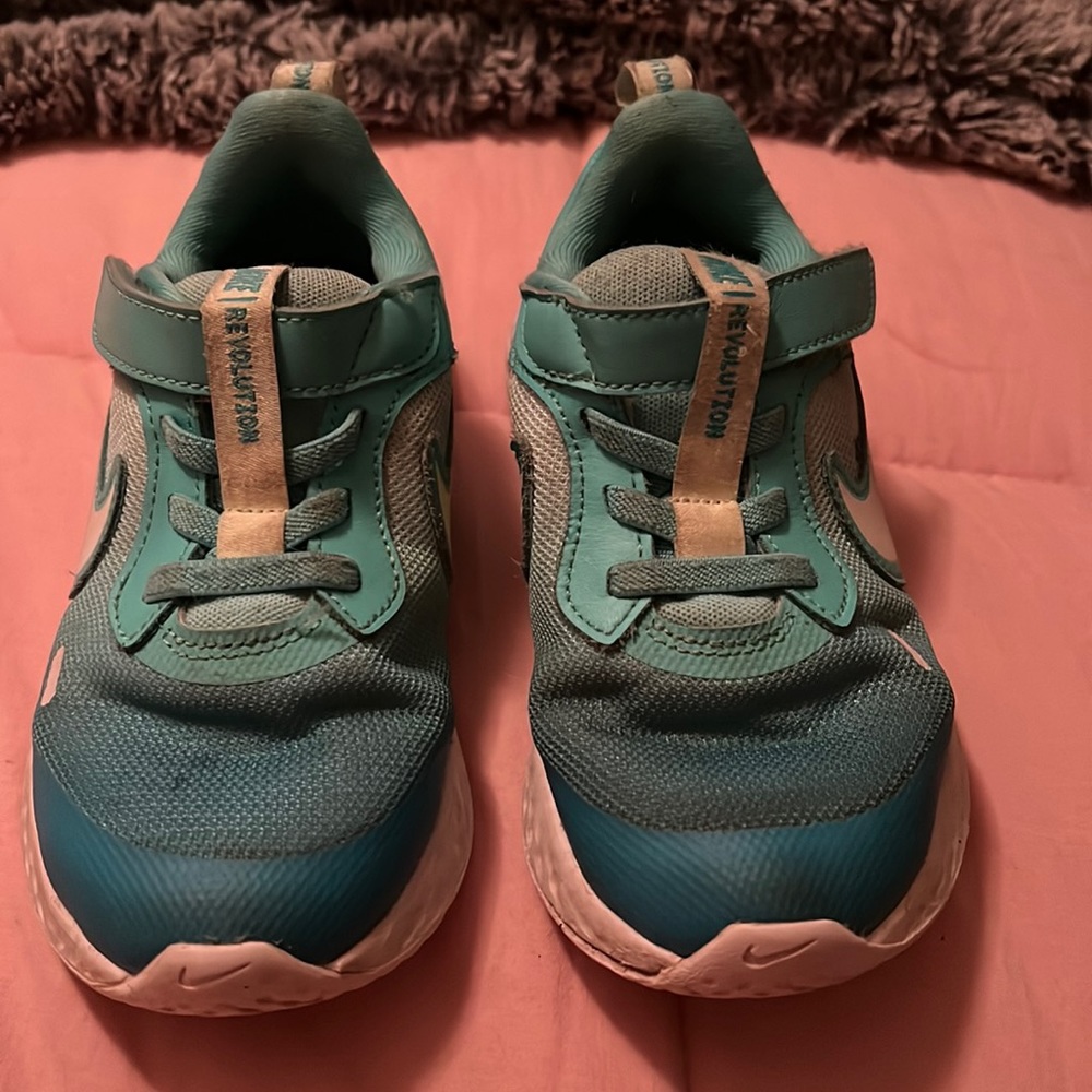 Gently used Toddler Girl Nike Revolutions Size 11C